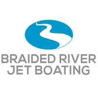 The Braided River Jetboating logo. It is a blue oval with a white river running through it. The rive gets thicker towards the foreground and thinner towards the background