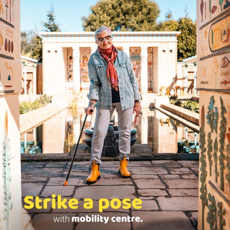 Promotional Material for the Mobility Centre. It depicts a older women with cane and reads "Strike a pose with Mobility Centre"